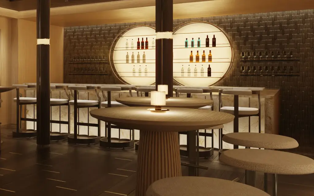 Amangati aman grill 02 1394x1394px | The Luxury Travel Atlas | The Luxury Travel Atlas Warm, Modern Bar Interior with Circular Backlit Bottle Shelves and Wooden Stools, Creating a Cozy Lounge Feel.