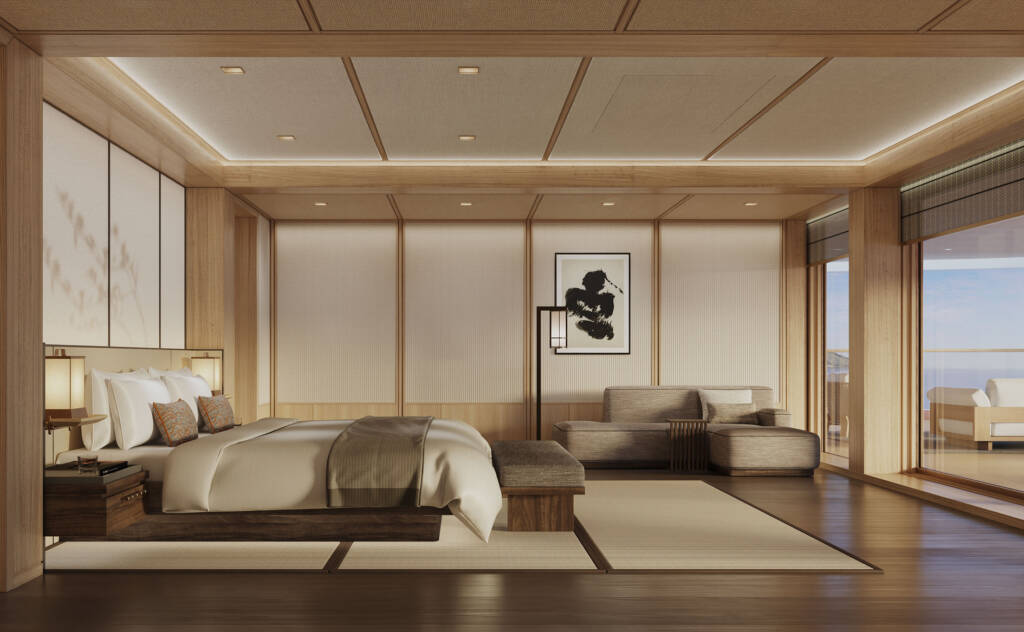 Luxurious hotel bedroom with a low platform bed, neutral bedding, and warm wood paneling.