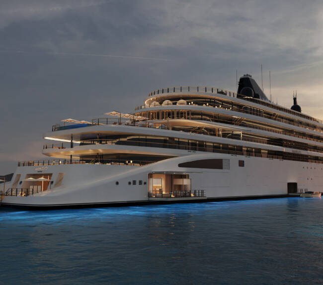 Amangati exterior 02 2880x1780px | The Luxury Travel Atlas Large White Luxury Yacht with Multiple Decks on Calm Water at Sunset, Featuring Outdoor Lounges and Glass Railings