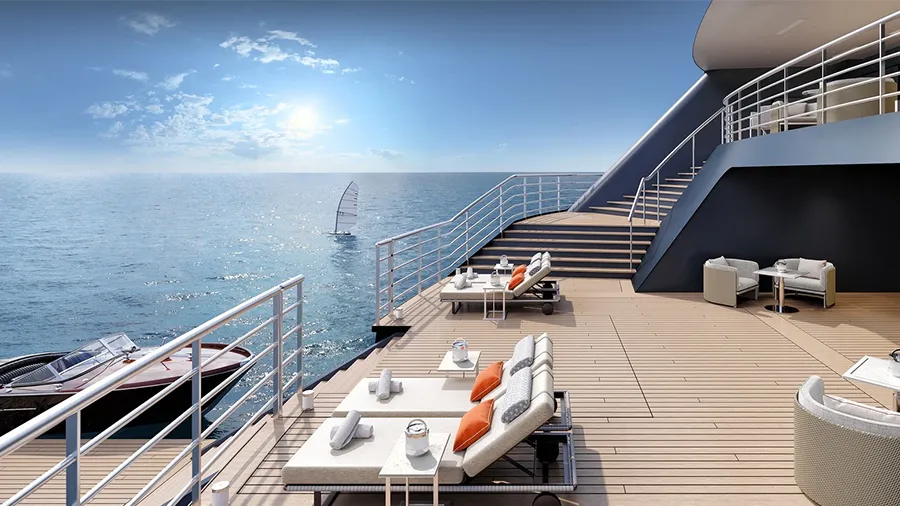 Luxurious Yacht Deck with Sun Loungers and Orange Pillows, Tables, and Sea View Under Sunny Sky.