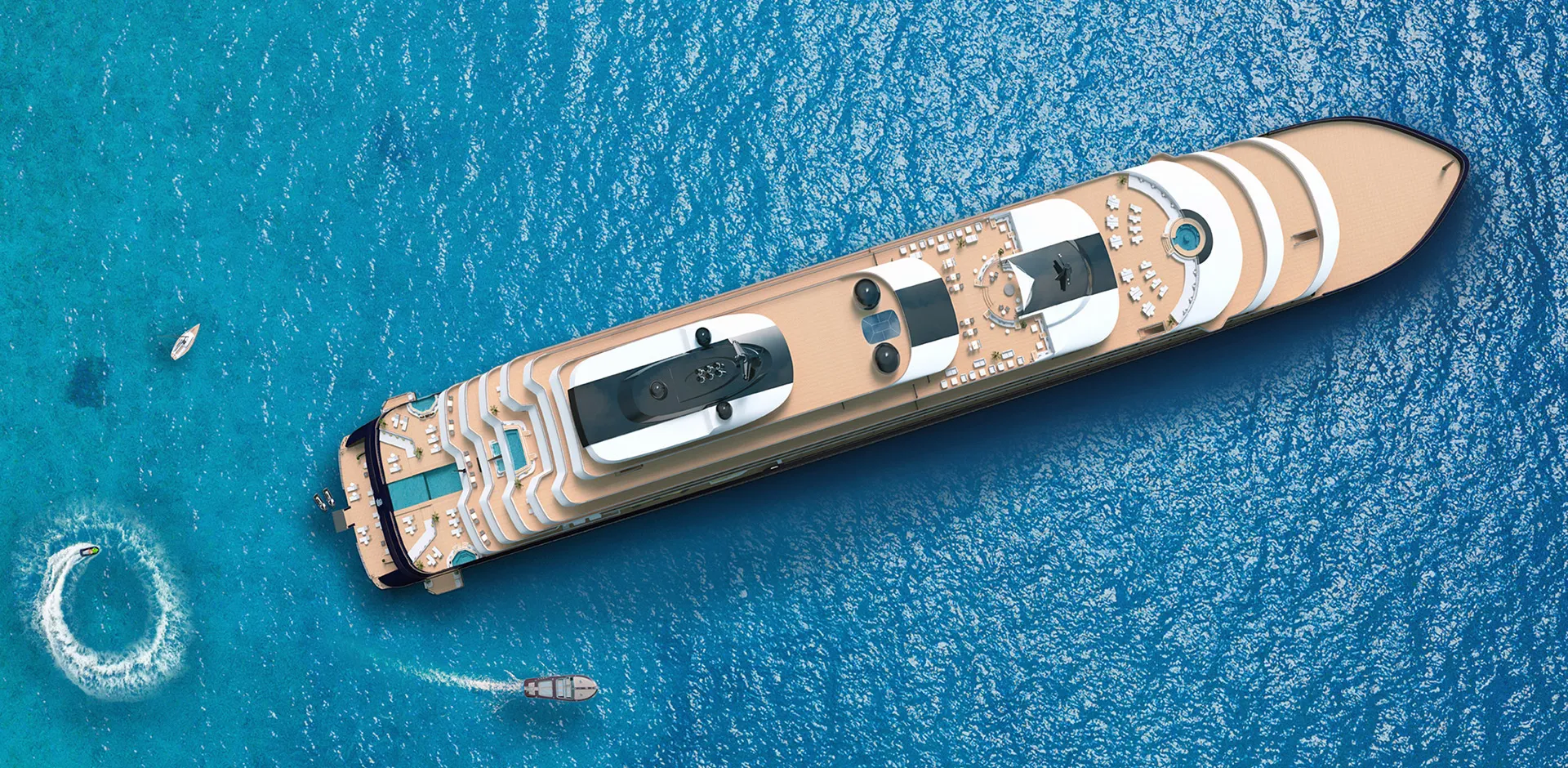 Aerial view of a large luxury yacht sailing in clear blue ocean.