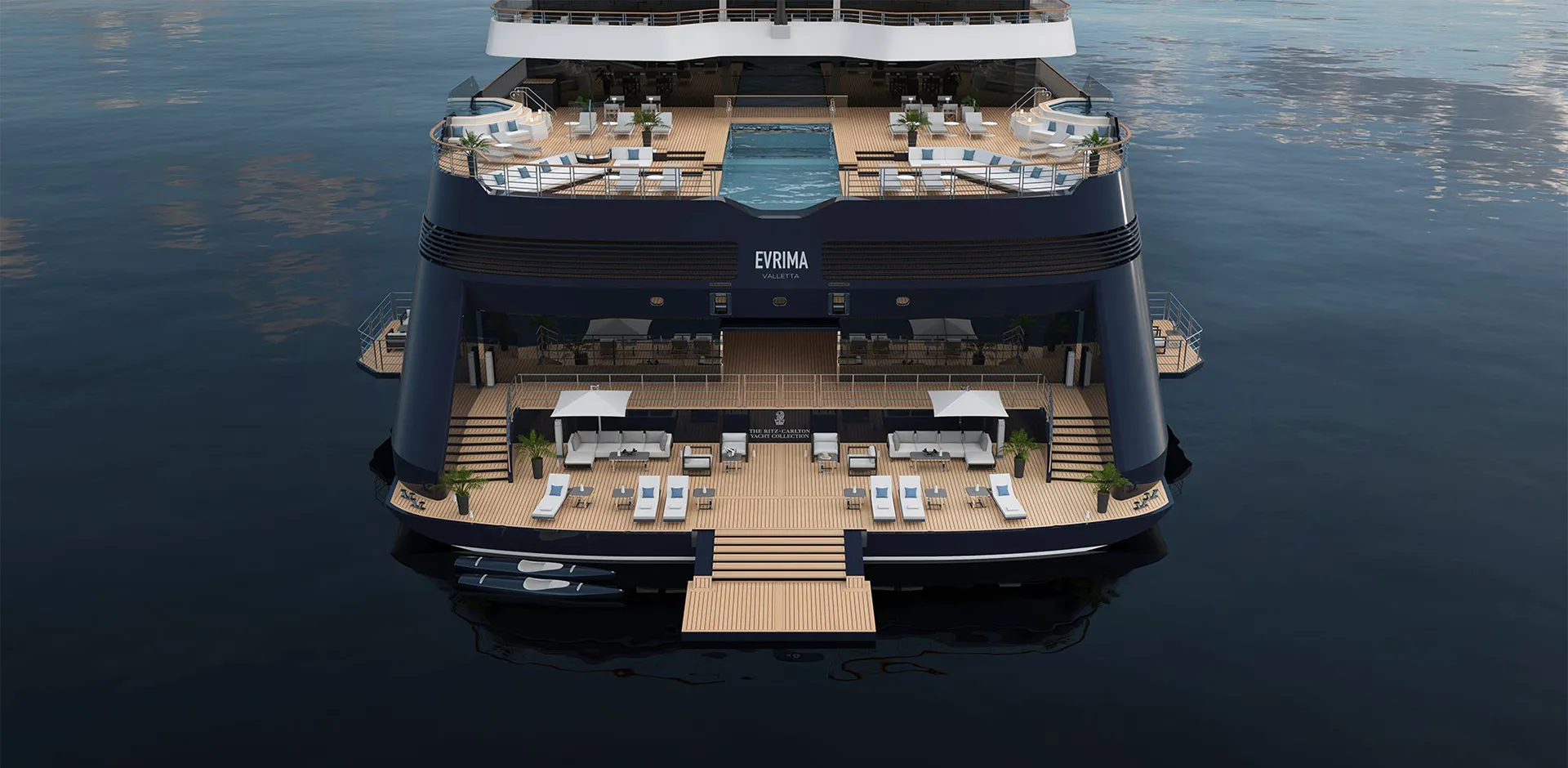 Top-down view of a large luxury yacht with multiple wooden decks, outdoor lounge areas, and a central pool seen from above, on calm water.